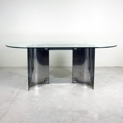 Vintage dining table from the 70's, in chromed metal and glass.