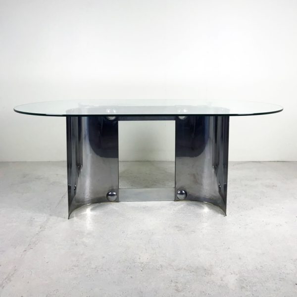 Vintage dining table from the 70's, in chromed metal and glass.