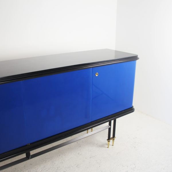 Vintage 1950s four-door sideboard in black lacquered wood and Klein blue, black metal and brass base.