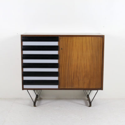 Italian vintage furniture, mahogany and six drawers in lacquered wood, black lacquered metal and brass legs, work from the 1950s.