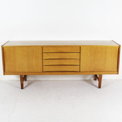 Vintage Danish sideboard in light oak from the 1960s, with sliding doors and four drawers in front.